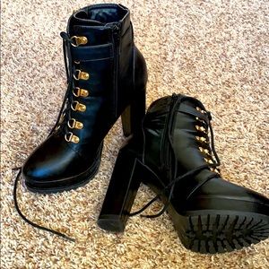 Black Boots with Gold accents.